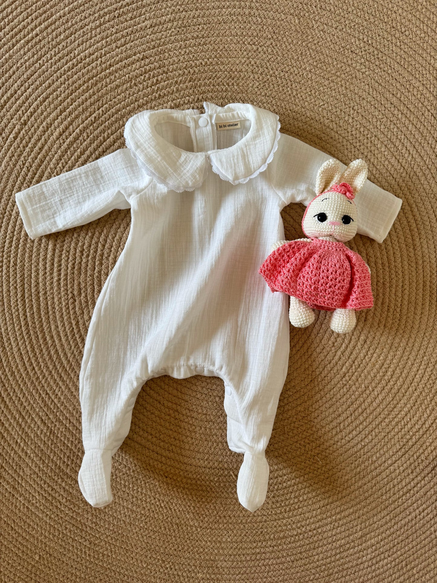 Tutina con peluche