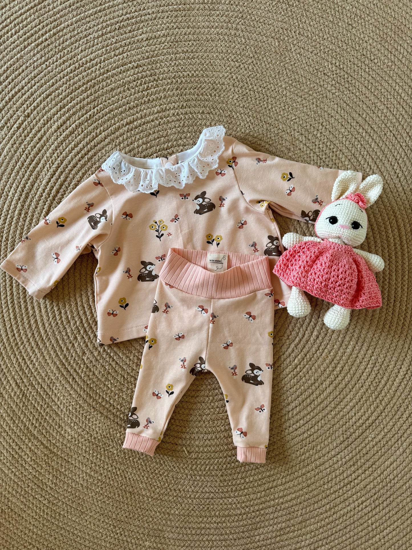 Tutina con peluche
